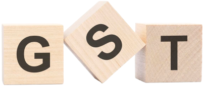 gst acronym from wooden blocks with letters goods services tax concept top view white background 1